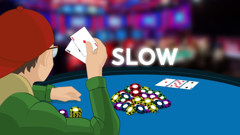 Player holding AdAc on a flop As8h2c with a SLOW sign